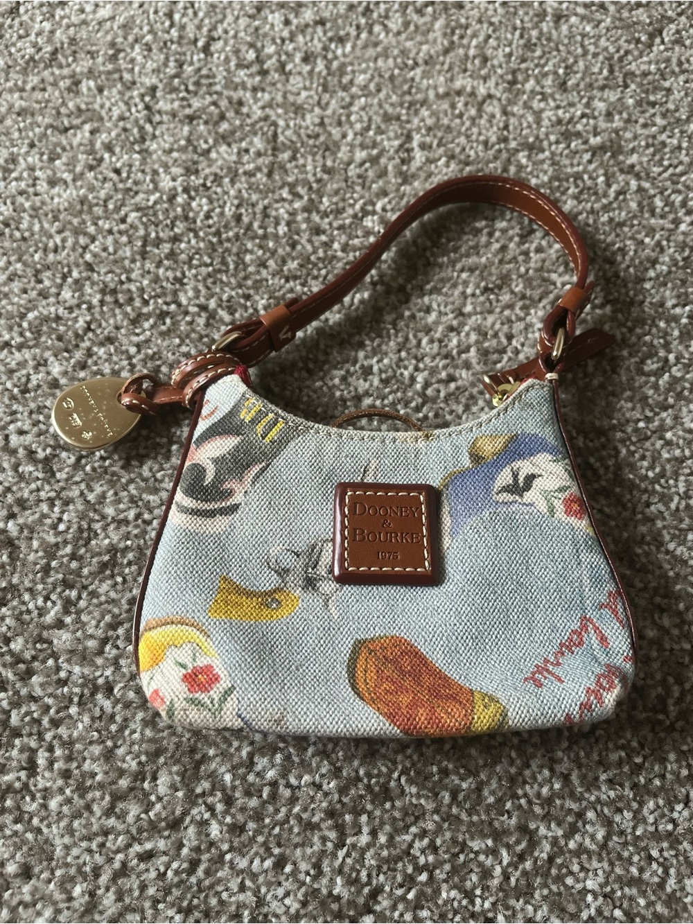 Dooney & Bourke Multicolor Printed Denim Wristlet with Brown Leather Trim